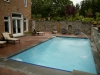 pool with brick patio