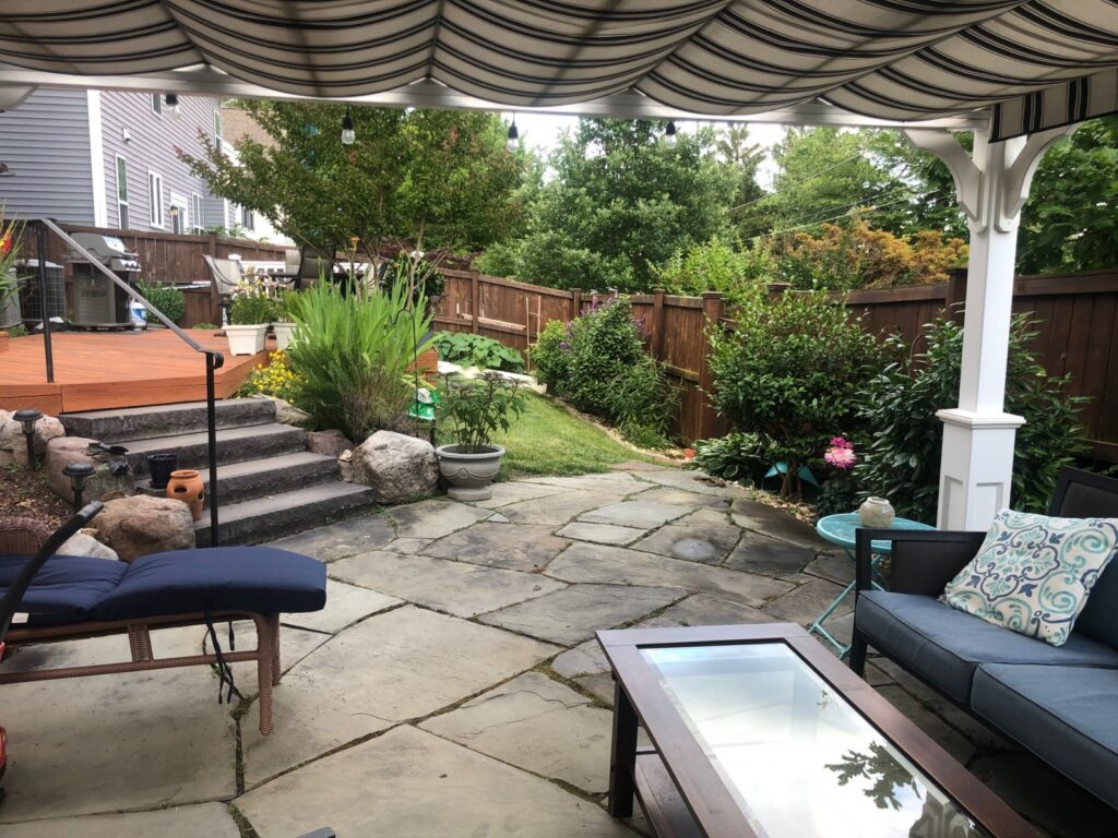 shaded area of backyard with covered pergola
